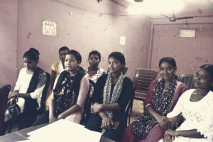 Santal artisans handcrafting eco-friendly notebooks and stationery at Tribal Veda Heritage.